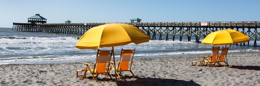 beachfront on Folly Beach with umbrellas