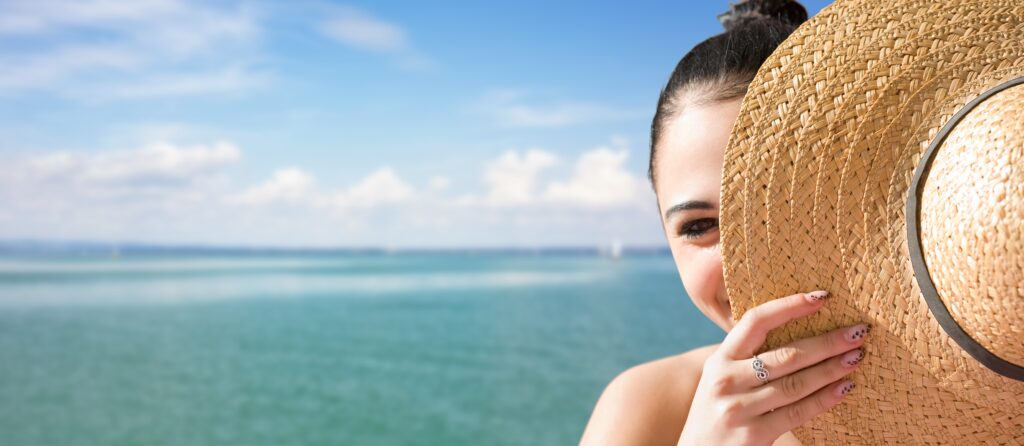 Girl on Beach with straw hat